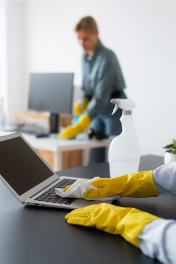 office chair cleaning services dusting laptops