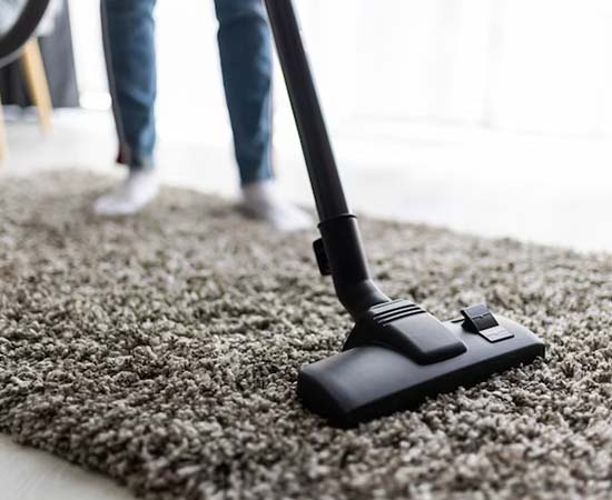 Office carpet cleaning services using vaccum machine cleaning